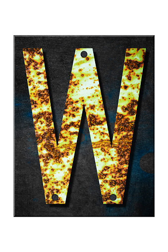 Letter W. Alphabet from letters, from rusty iron, on a wooden plank. Isolated on white background. Education. Design element.