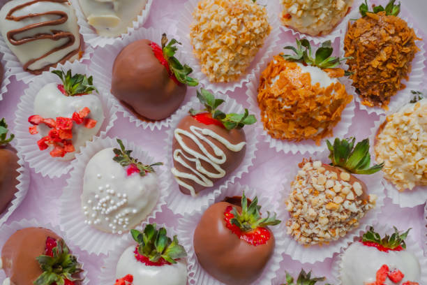 istock Close up, top view: set of fresh chocolate covered strawberries 1414013371