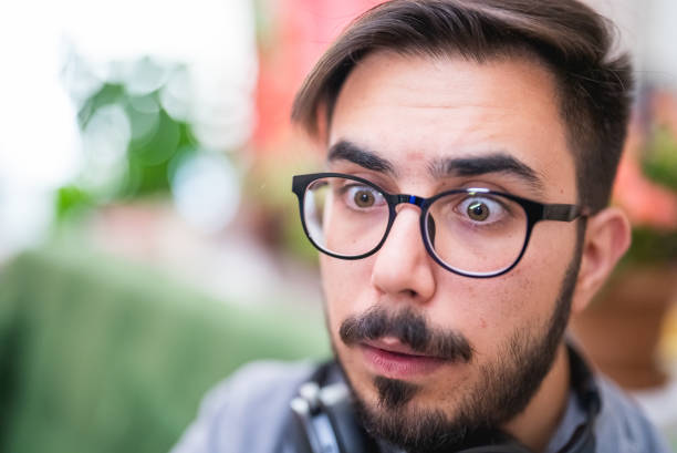 Young man watching a video