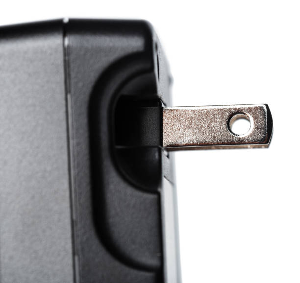 istock charger for digital photo cameras on isolated white background 1414013966