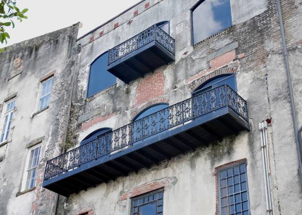 istock Brick and Gray Stone Building with a Balcony 1414015361