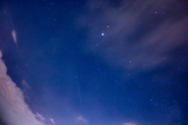 istock Milky Way stars and constellations on evening sky. 1414017548