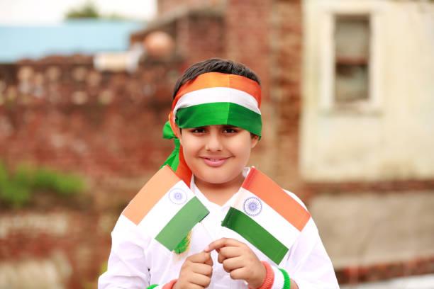istock Cheerful child holding national flag in hands 1414018286