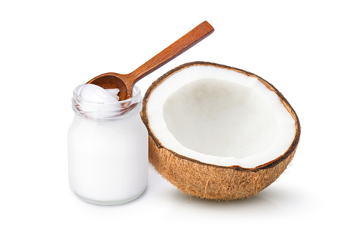 Coconut oil butter and coco nut fruit isolated on white background.