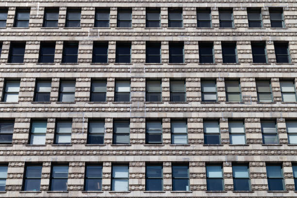 istock Generic Stone Exterior of an Old Skyscraper Office Building in Chicago 1414022178