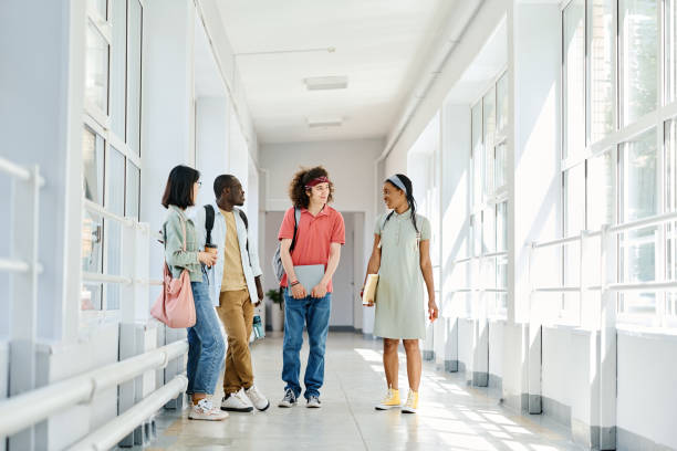 istock Multiethnic group of students at school 1414023701