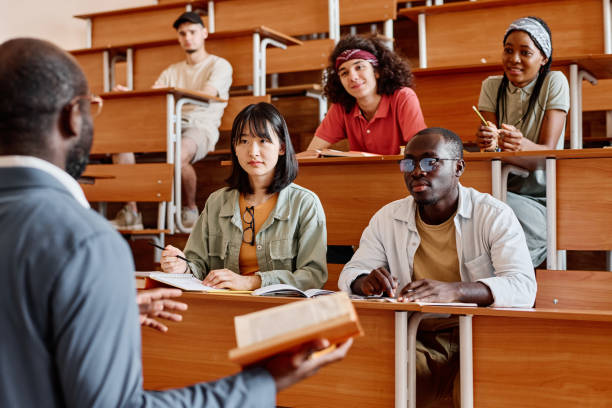 istock Students listening to teacher at lecture 1414024665