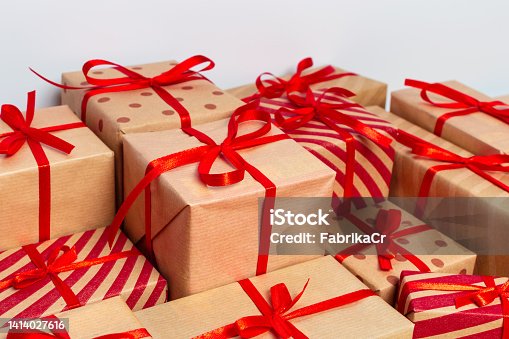 istock Christmas gift box on tablet 1414027616