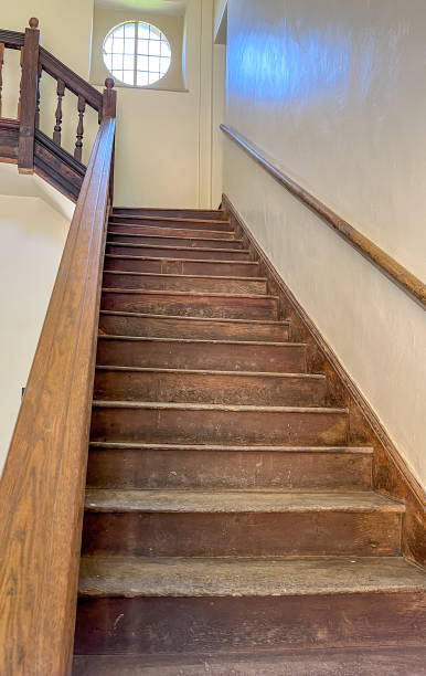 istock Steep wooden staircase 1414031095