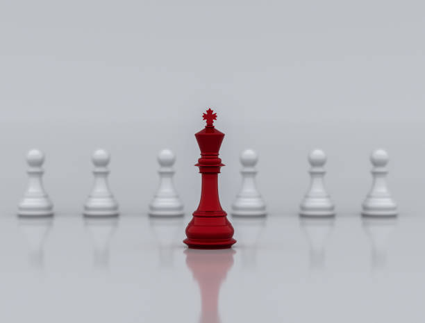 istock A red chess king stands at the front leading a white chess piece, 3d illustration 1414031214