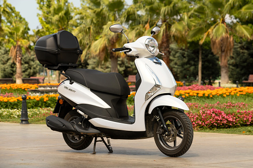 Rome; Italy - June 27; 2018: Two-cylinder scooter Yamaha Tmax; parked on the seafront in Rome. Produced in Japan by Yamaha Motor since 2001.
