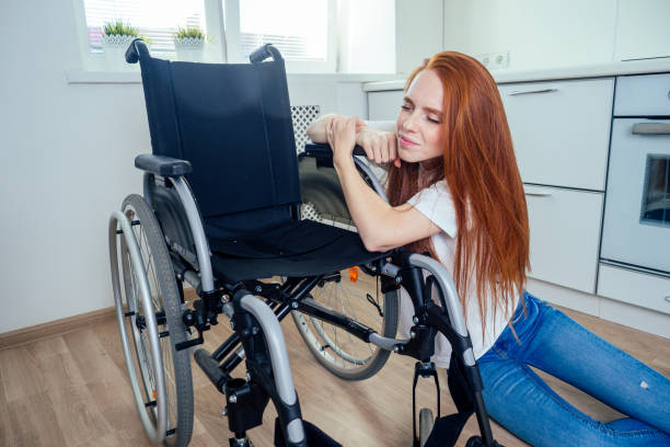 istock redhaired ginger woman falling down and crawling for help in kitchen room 1414036395