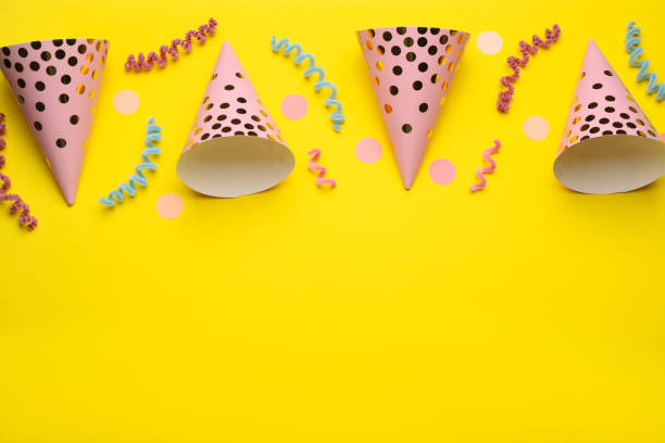 istock Flat lay composition with party items on yellow background, space for text 1414040317