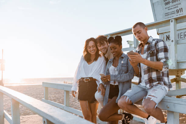 istock Friends on the beach in Venice, California 1414041069
