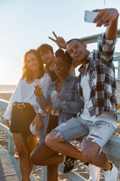 istock Friends shoot a selfie in Venice Beach 1414041216