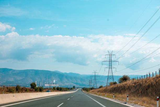istock view of highway road at sunny day 1414042864