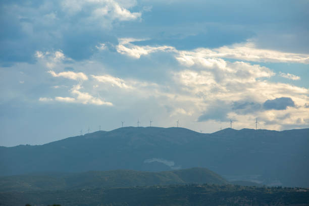 wind plant green energy at Greece mountains copy space