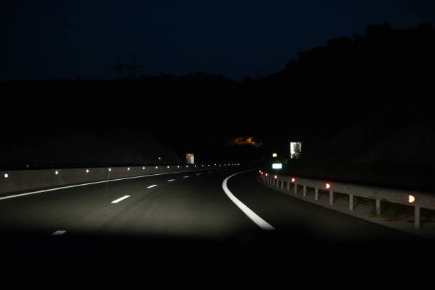 istock night road car travel 1414042951