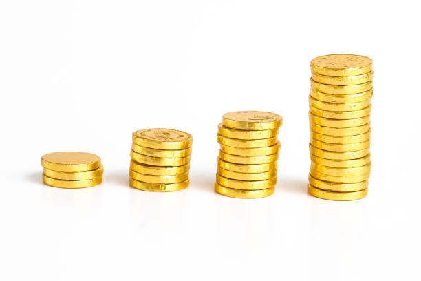 stack of gold coins isolated on white background,business concept. - chocolate coins imagens e fotografias de stock