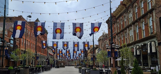 The heart of Larimer Square in Denver, Colorado, any urban city scene with a friendly, cozy atmosphere, ready for dining and shopping.