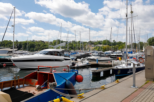 Gdynia, Poland - June 03, 2022: Various boats moored in the marina located at the southern pier of the port.