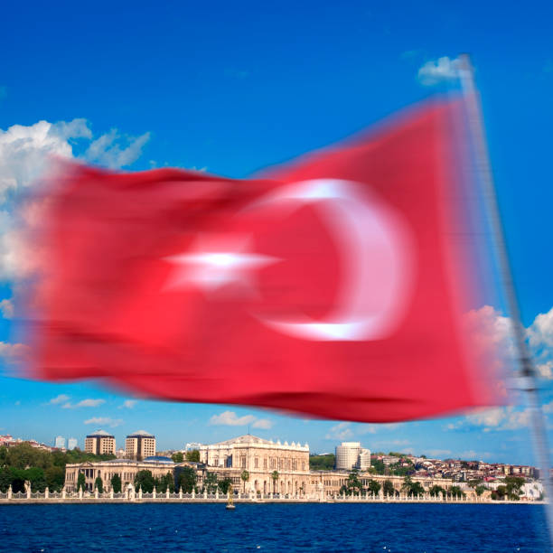 istock Istanbul Dolmabahce Palace and Turkish flag 1414051832