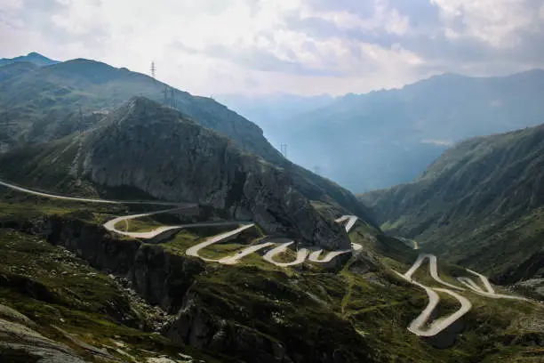 View on the cobbled hairpin bends of the old Tremola Gotthardpass in the Swiss Alps.