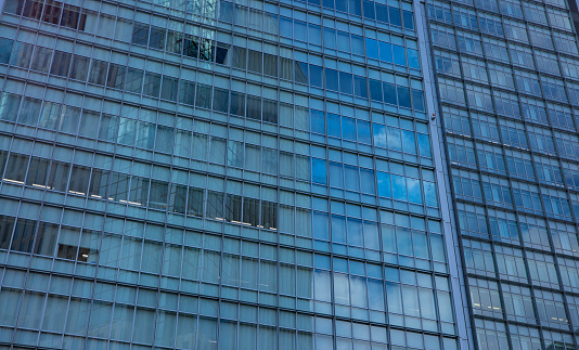 A cloud reflecting the building in the business town. High quality photo. Nakano district Nakanosakaue Tokyo Japan 07.20.2022 Here is a center of the city in Tokyo.