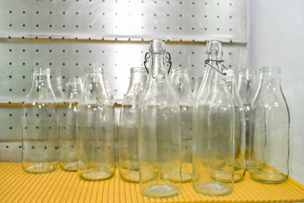 Tethered Bottle Cap Open, bottle of orange juice