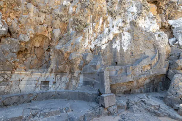 Photo of A statue of a ship carved into the rock on the Acropolis.