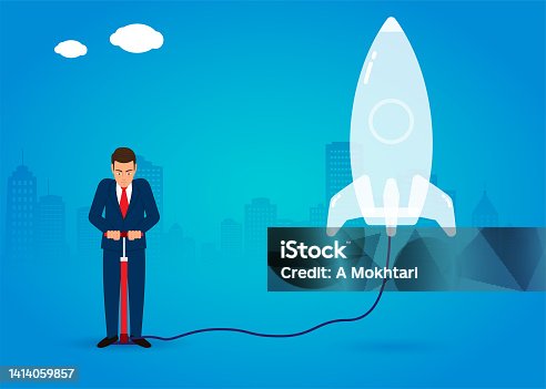istock Launch a project, an idea, discover space...man inflates a rocket. 1414059857