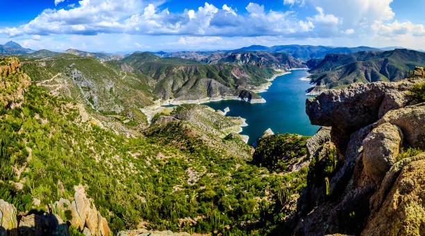 Panoramic view of the dam surrounded by mountains in Zimapan Hidalgo Hydroelectric dam in Zimapan Hidalgo, sunny day and sky with clouds, mountains around ryfylke stock pictures, royalty-free photos & images