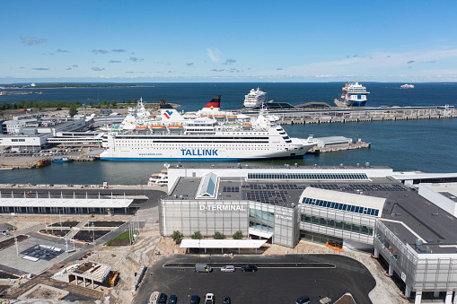 Aerial view of the terminal buildings and various passenger ships in the harbor of Tallinn, Estonia.
