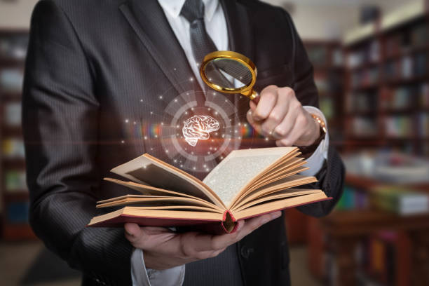 Concepts of searching and gaining knowledge . stock photo
