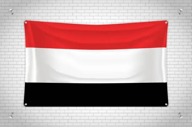 Vector illustration of Yemen flag hanging on brick wall.