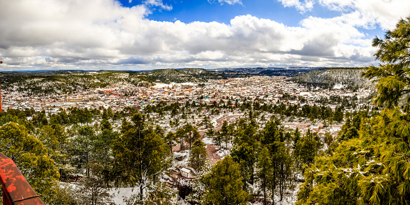 Winter landscape in Creel Chihuahua, snow-covered town surrounded by mountains and pines in the Sierra Tarahumara