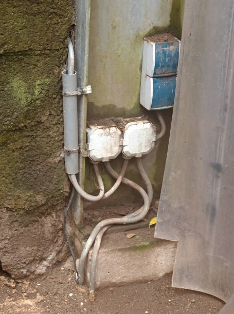 istock Electrical charging socket on outside wall of home 1414072293