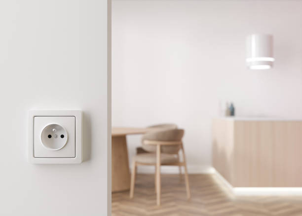 istock White electric socket on the wall at home. Close up view. Save electricity, electricity is getting more expensive. Energy crisis, energy price. 3d rendering. 1414075020