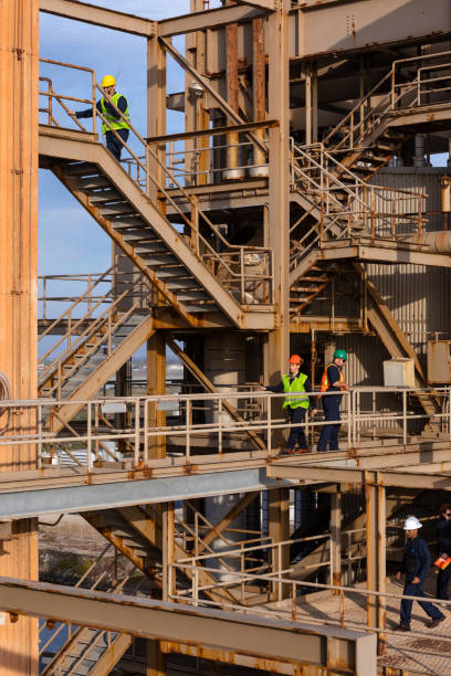 istock Busy Workers on Different Levels at Power Plant 1414082114