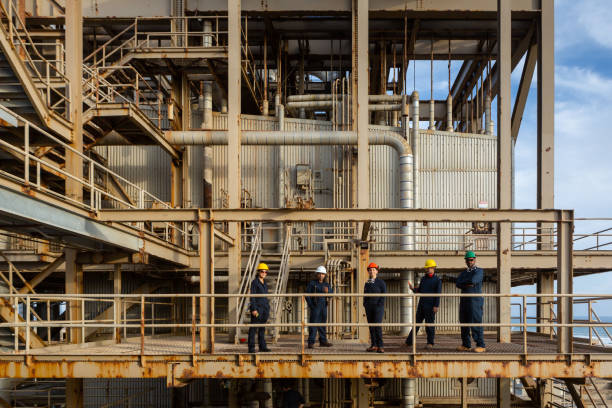 istock Portrait of Workers on Power Plant Walkway 1414082185