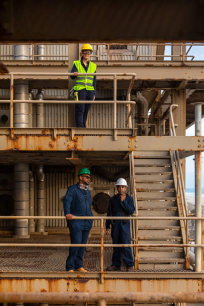 istock Workers Posing on Two Levels at Industrial Facility 1414082321