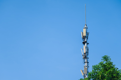 Technology telecommunication tower  antennas wireless technology with blue sky .