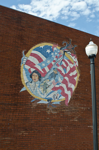 A street mural of Cherokee men and women who have served in the Armed Forces is located right downtown.