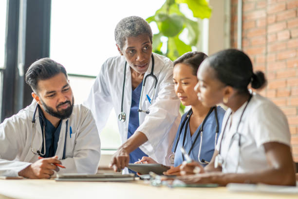 istock Doctor Meeting with Medical Students 1414091146