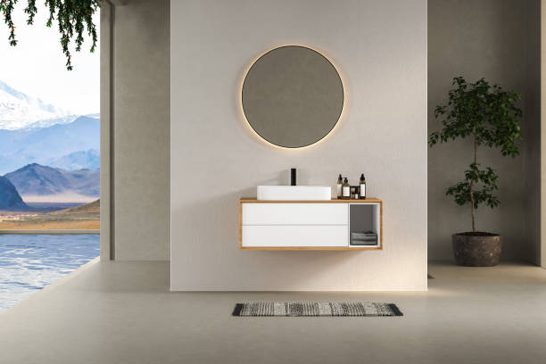 istock Minimal bathroom interior with white and concrete walls, white basin with oval mirror, bathtub, shower 1414093786