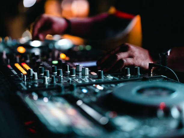 istock a dj playing music in a nightclub 1414095363