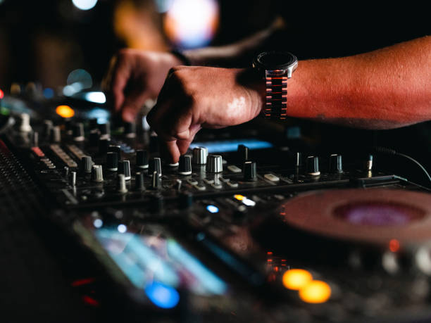 istock a dj playing music in a nightclub 1414095364
