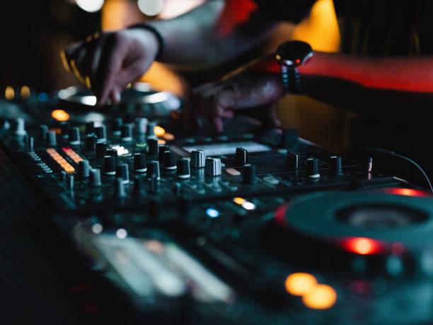 istock a dj playing music in a nightclub 1414096154