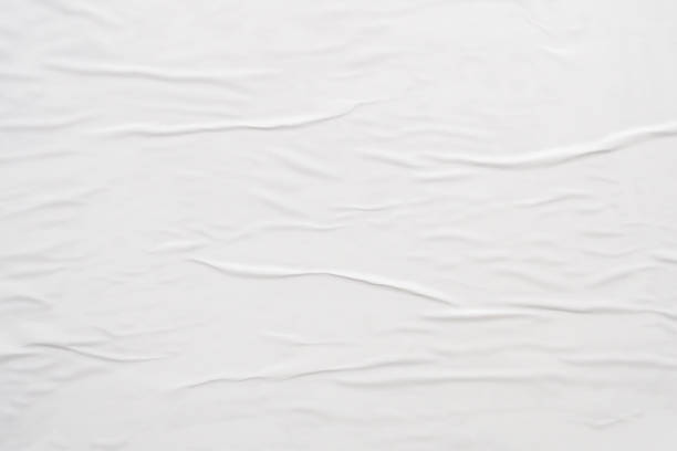 istock white crumpled and creased paper poster texture background 1414107268