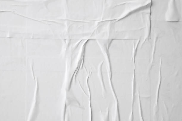 istock white crumpled and creased paper poster texture background 1414107275